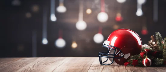 Fotobehang American football helmet on an empty table with a background of Christmas lights © Jess rodriguez