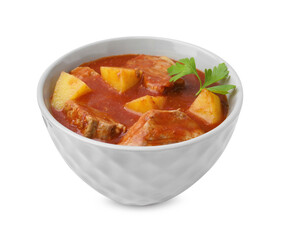 Delicious goulash in bowl isolated on white