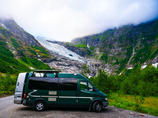Van camper at Boyabreen Glacier in Norway