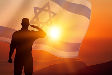Silhouettes of soldiers on the background Israel flag.