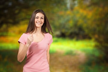 Fototapeta premium Hello autumn. happy woman running in the park