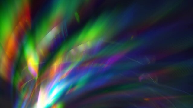 Brilliant sparkling background for party. The light passes through the facets of a crystal and creates sparkling highlights and holographic colors