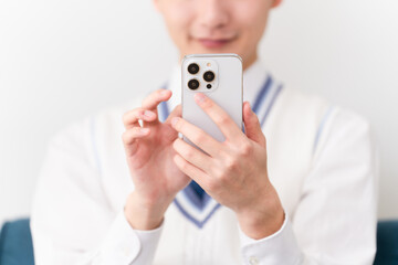 学生服を着ている若い男性　学生イメージ