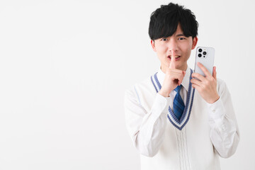 学生服を着ている若い男性　学生イメージ