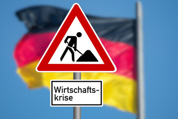 Flagge von Deutschland, Verkehrsschild Baustelle und Hinweis auf die Wirtschaftskrise