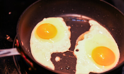 brown eggs in a rustic basket on wooden table, natural light, farm-fresh concept