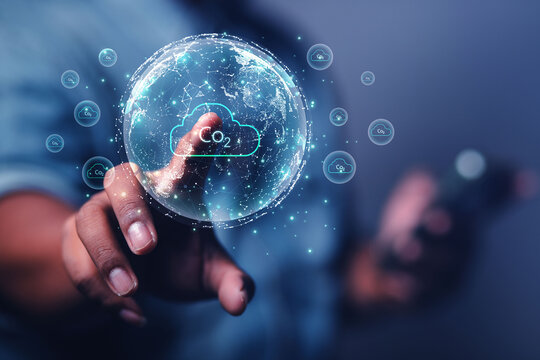 Businessman show with environmental icons for reducing CO2 emissions, sustainable development and green business from renewable energy. Concept Carbon Neutrality.