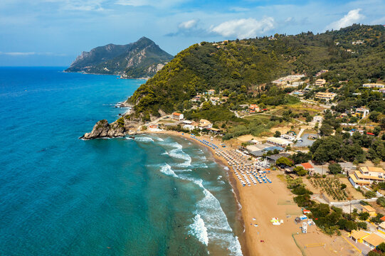 Aerial drone view over western coast and Glyfada beach, Island of Corfu, Greece. Glyfada Beach at Corfu Greece during the day.