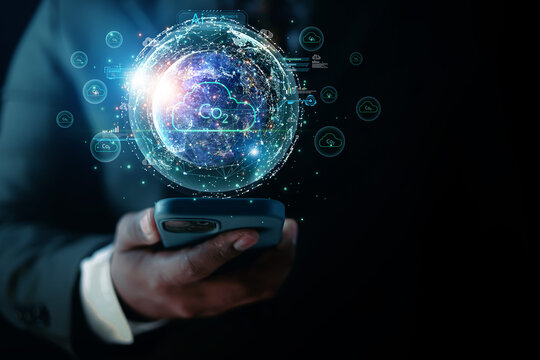 Businessman show with environmental icons for reducing CO2 emissions, sustainable development and green business from renewable energy. Concept Carbon Neutrality.