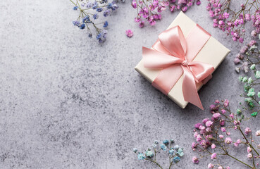 Gift box and colored gypsophila flowers