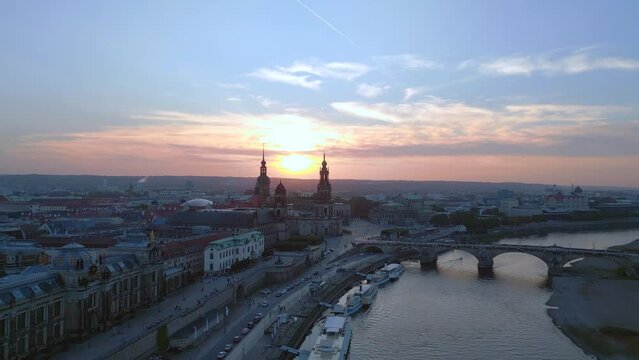 Fantastic aerial top view flight 
Sunset city Dresden Church Cathedral Bridge River. panorama overview drone
4k Landscape footage