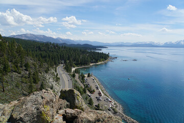 View of Highway 50 from the top of Cave Rock on the East Shore of Lake Tahoe on a sunny day with blue skies