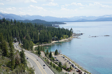 View of Highway 50 from the top of Cave Rock on the East Shore of Lake Tahoe on a sunny day with blue skies
