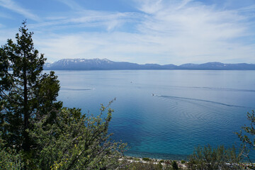 Scenic view of mountains and forested coastline of the East Shore of Lake Tahoe from the top of Cave Rock, Nevada    