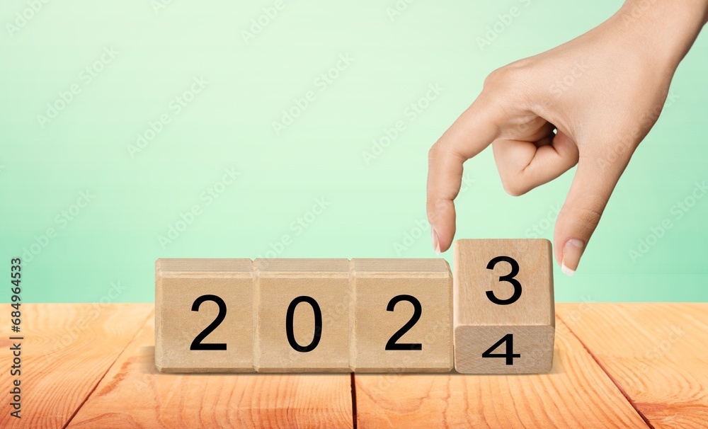 Poster Starting 2024 new year on wooden blocks.