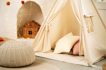 Children's room with play tent teepee and pillows © fotofabrika