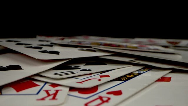 Scattered Playing Cards in Dark Ambiance. Probe lens macro
