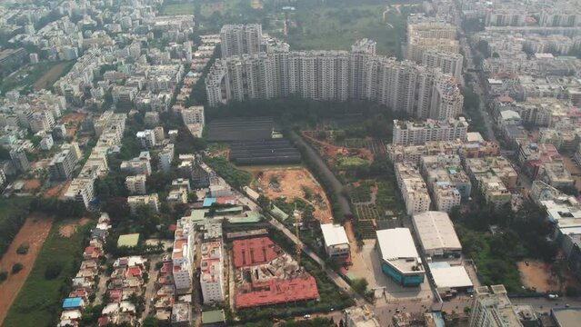 A cinematic footage of Bengaluru's most famous area Electronics City Phase 1  during early morning. Ajmera Infinity apartment and Concorde Silicon Valley.Wipro Campus (Electronic City SEZ)