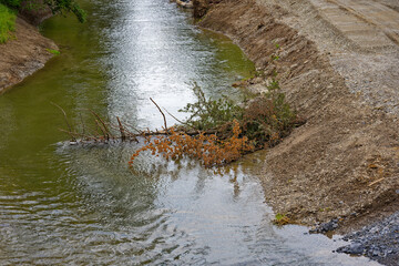 Aerial view of renaturation construction site of Glatt River at City of Zürich district Schwamendingen on a sunny hot summer day. Photo taken July 10th, 2023, Zurich, Switzerland.