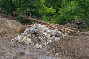 Material at renaturation construction site of Glatt River at City of Zürich district Schwamendingen on a sunny hot summer day. Photo taken July 10th, 2023, Zurich, Switzerland.