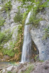 The scenic hike to Theth Waterfall and the Blue Eye spring in Theth, Albania
