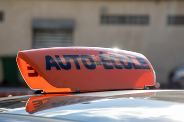 auto ecole french text sign means driving school panel on the car roof