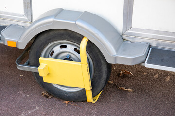 Wheel lock for anti theft trailer protection system against automobile trailer theft by blocking...