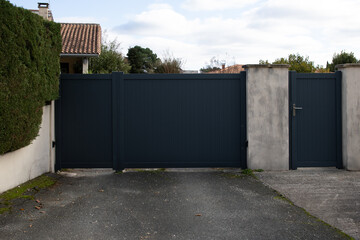 door modern grey gate and pedestrian gray aluminum portal of home