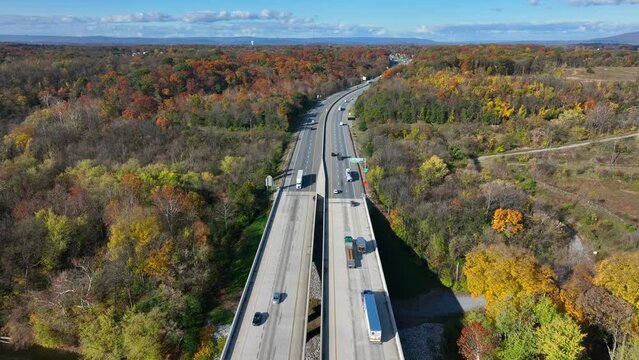 Route 11 Bridge over Potomac River at the border of West Virginia and Maryland. Aerial shot high above welcome to WV sign during autumn.