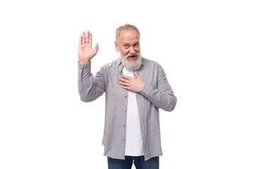 handsome funny gray-haired elderly man with a beard and mustache in a plaid shirt on a white background with copy space