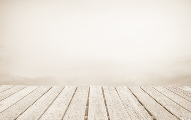 Wooden terrace the blurred and Christmas background concept. Wood white table top perspective in front of natural in the sky with light and mountain blur background image for product display montage.