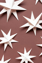 Merry Christmas. Hand made Christmas stars, Christmas background, holiday card. DIY Christmas flat lay. Christmas zero waste, paper, eco postcard.New year,new year poster eco friendly diy