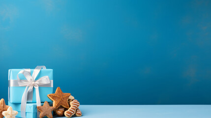 Hanukkiah gingerbread gift boxes and donut on blue background