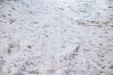 path covered in snow. close-up of a snow path. ground view in winter. path of disturbed snow. close up of snow on the ground