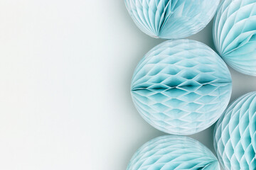 Tissue paper balls on a blue background. Holidays decor.