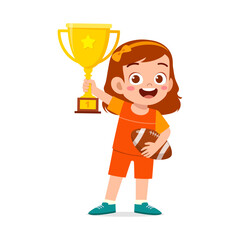 little kid holding trophy winning in sport