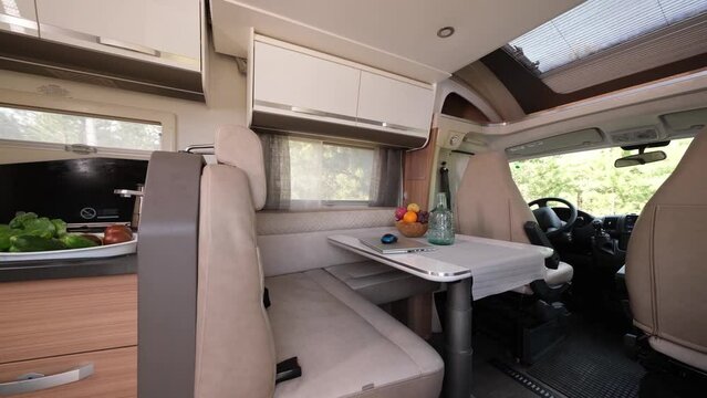 Interior of the kitchen and recreation area in the motorhome