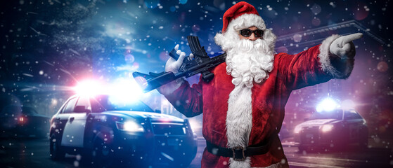 Santa Claus, holding a machine gun, points his finger somewhere, posing in front of police cars...