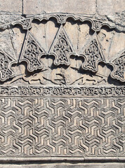 Retro background with ancient carved stone ornament. Geometric stone bas-relief with traditional...