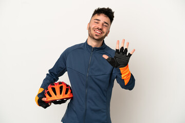 Young cyclist man isolated on white background counting five with fingers - obrazy, fototapety, plakaty