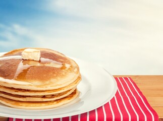 A stack of fresh sweet fluffy pancakes