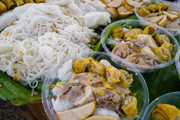 Koufu meal with noodles in the Orussey market in Phnom Penh