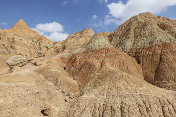 Intensely colored and eroded mountains around the Saddle Pass Trail in the Badlands National Park