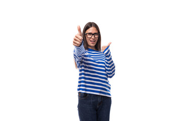 positive smiling young brunette woman in eyeglasses feels confident