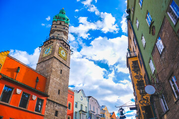 The Innsbruck town tower or Stadtturm Austria landmark colorful scene 