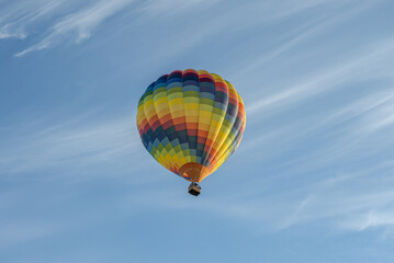 Stockholm, Sweden One colorfull hot air balloon flying over the Old town