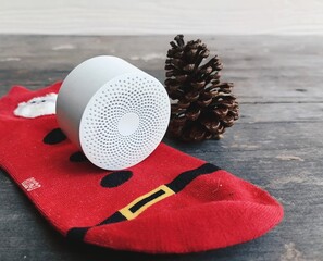 Bluetooth speaker and christmas decorations socks and pine flowers