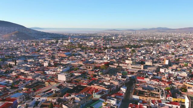 Mexico, Pachuca: Aerial view of capital city of Mexican state of Hidalgo at sunrise - landscape panorama of Latin America from above