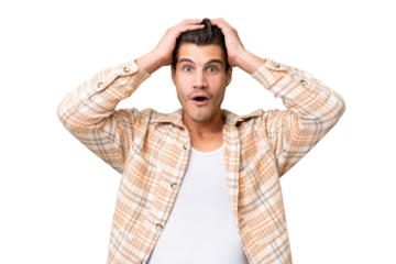 Young handsome caucasian man over isolated background with surprise expression