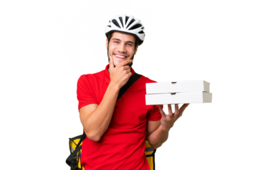 Pizza delivery man with work uniform picking up pizza boxes over isolated background happy and smiling